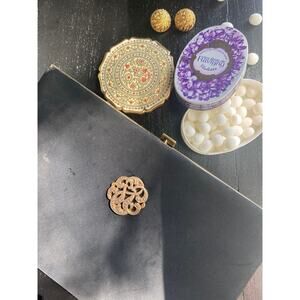 Vintage evening clutch in black shaped like a book